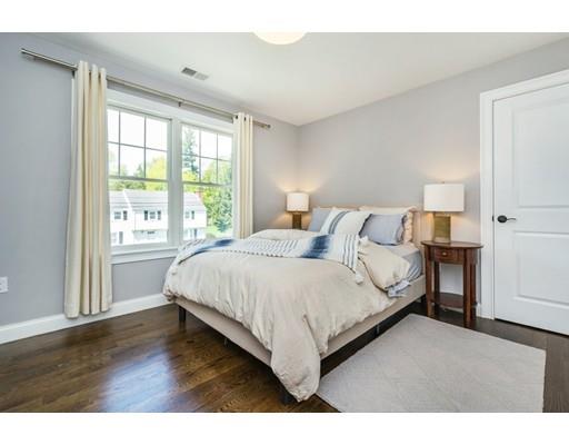 17 Ridgeway Avenue Needham, MA 02492 - Photo 24 of 30 a bedroom with a bed and a large window