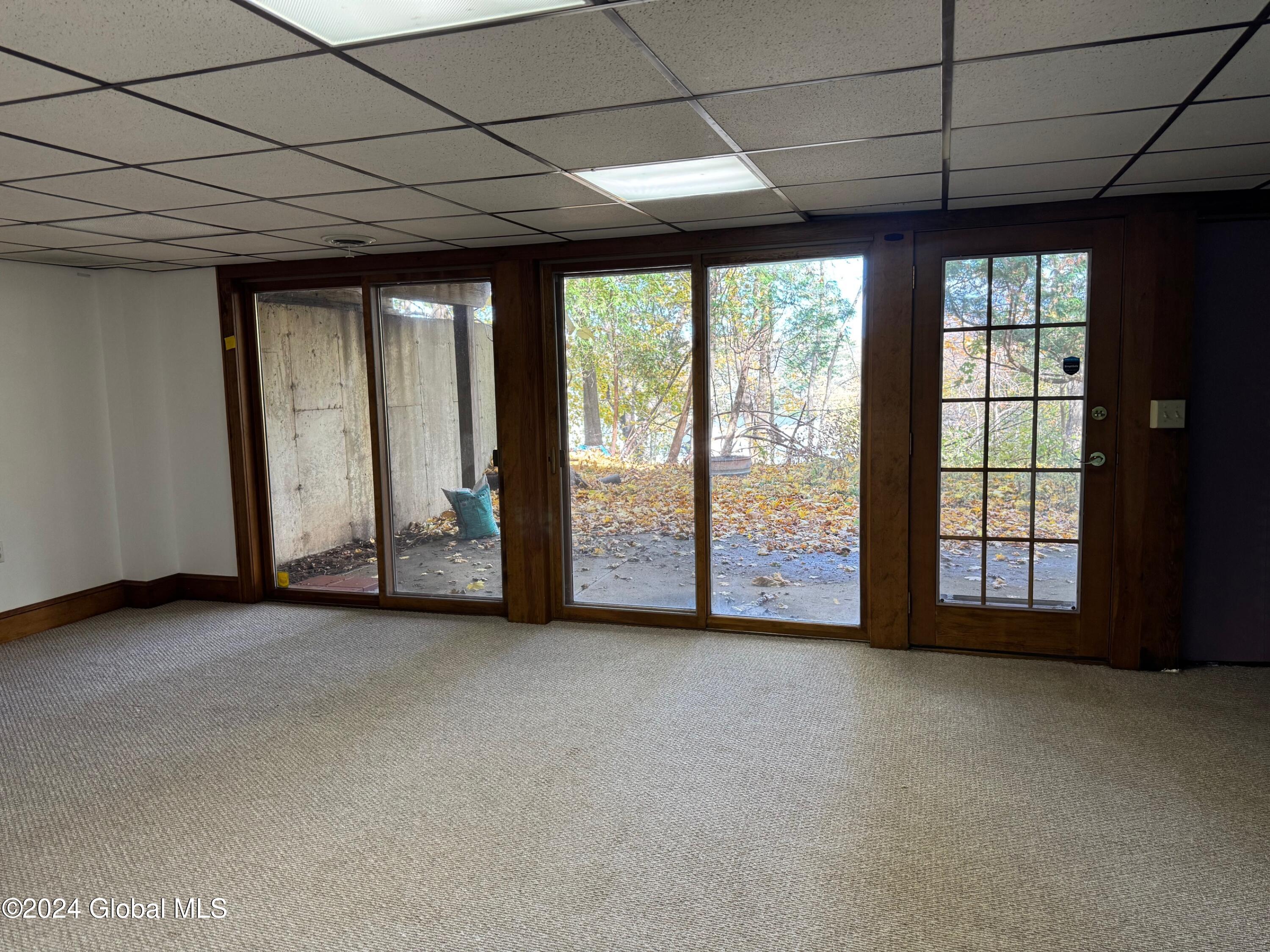 20 Westover Road Troy, NY 12180 - Photo 13 of 20 Lower Level living room window