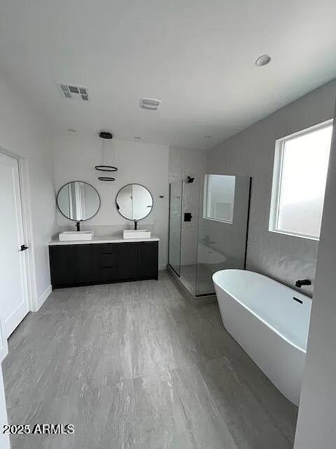 2826 North 28th Place Phoenix, AZ 85008 - Photo 5 of 8 a living room with furniture and a wooden floor