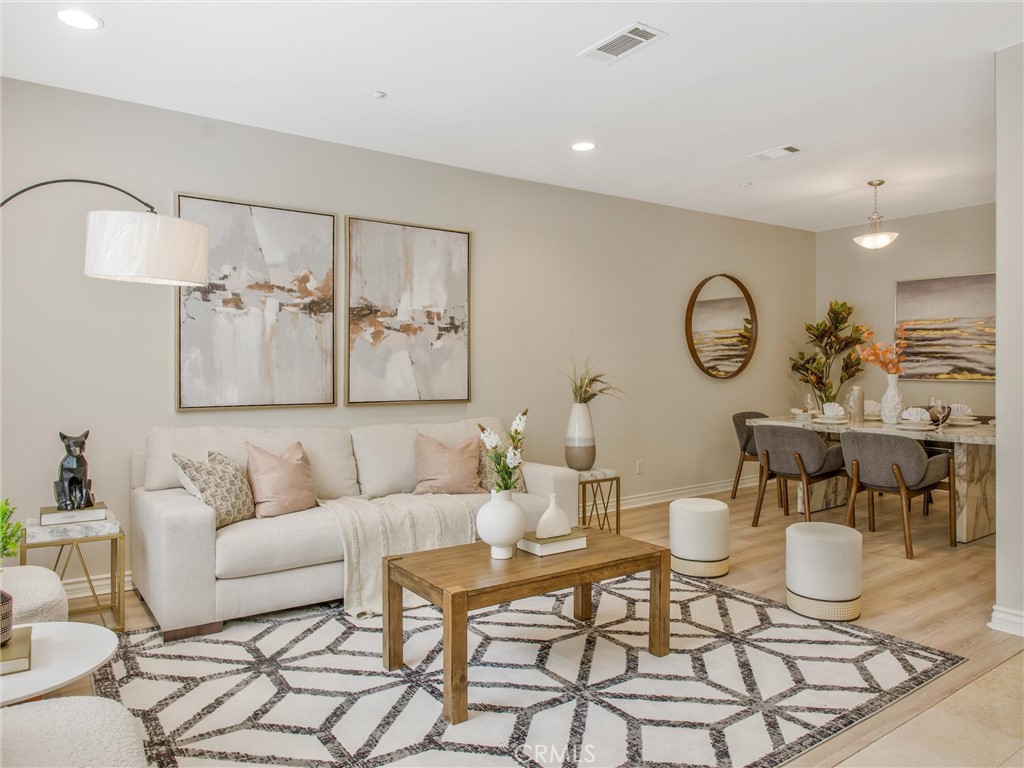 455 Fairview Avenue Arcadia, CA 91007 - Photo 2 of 4 a living room with furniture and wooden floor