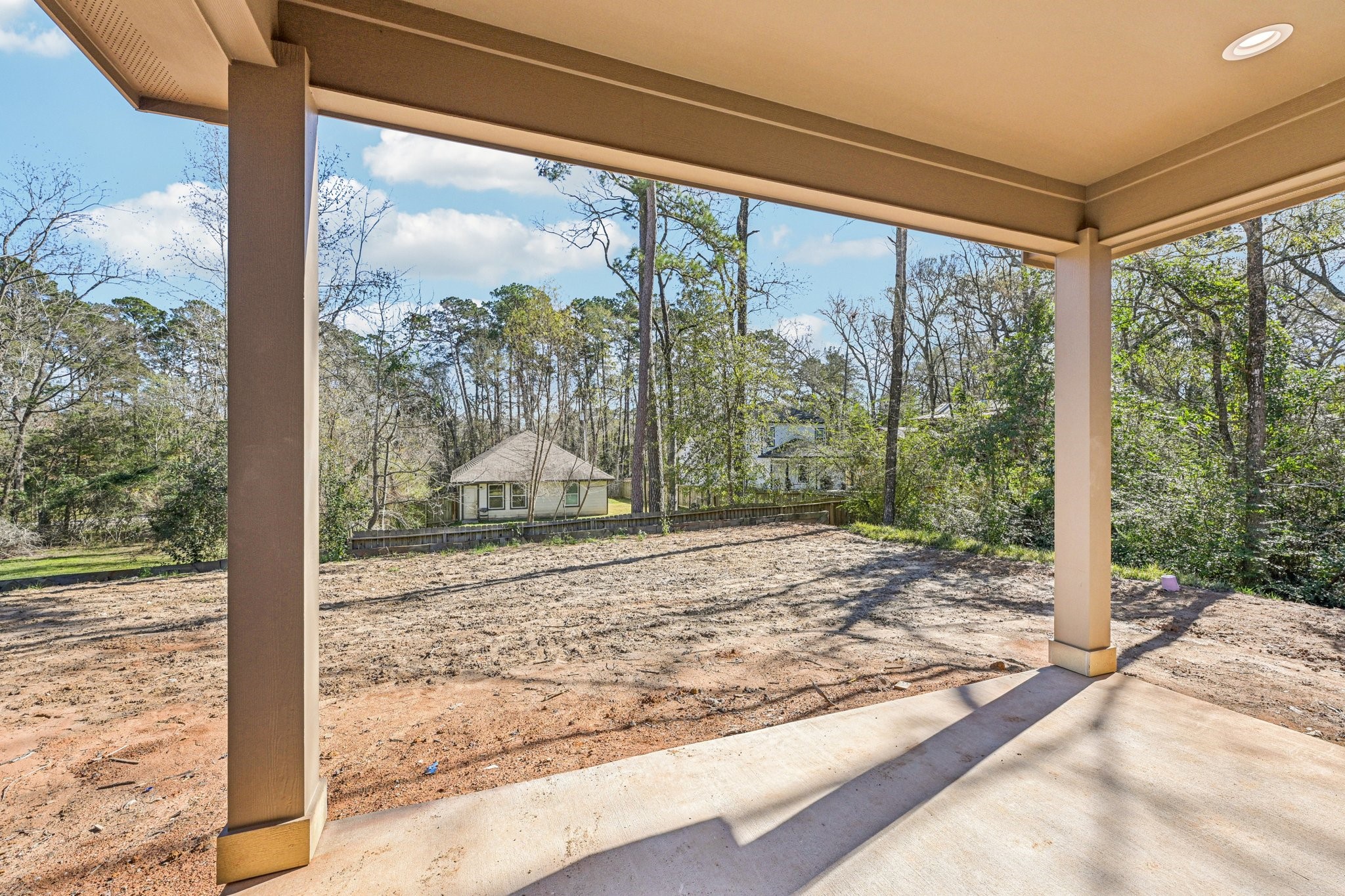 15132 Coaltown Road Willis, TX 77378 - Photo 28 of 29 view from the covered patio, Perfect for outdoor activities and relaxation.