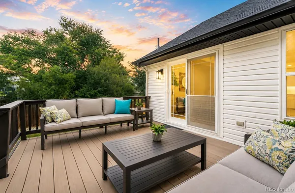 a outdoor living space with furniture and a potted plant