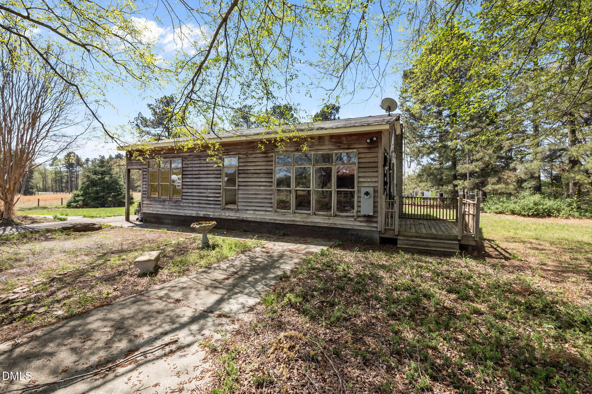 212 Thomas Humphries Road Roxboro, NC 27574 - Photo 49 of 56 a view of a house with a yard