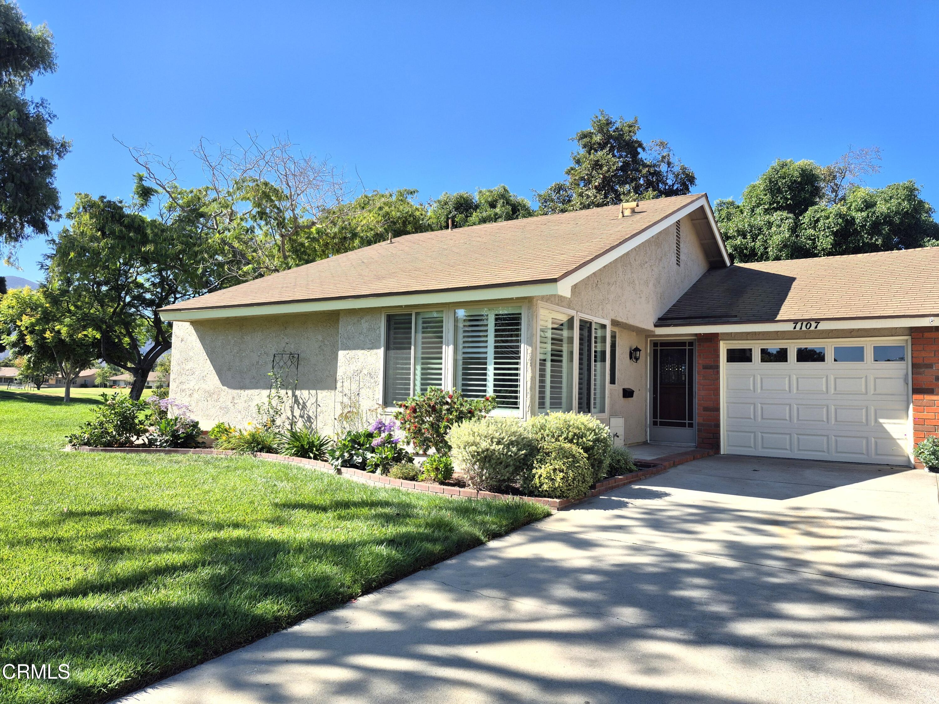 7107 Village 7 Camarillo, CA 93012 - Photo 1 of 21 a view of a house with yard and plants