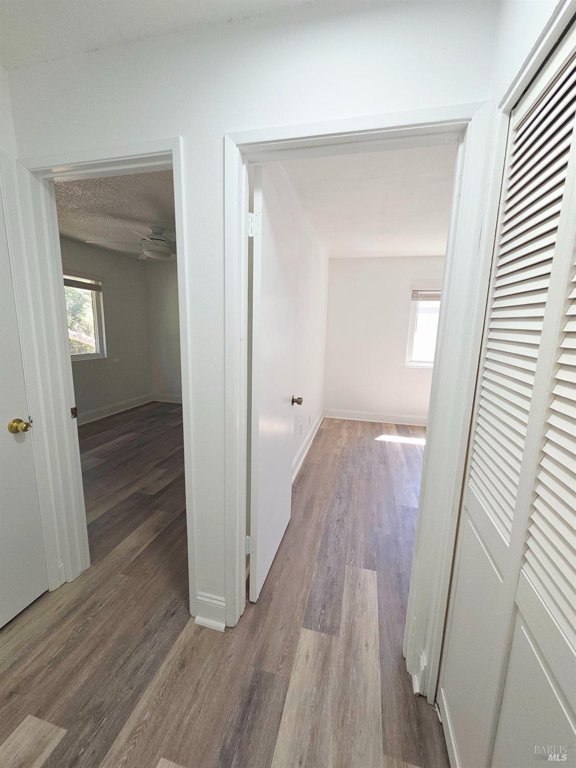 140 Del Rio Court, Unit 4 Vacaville, CA 95687 - Photo 13 of 25 a view of a hallway with wooden floor and staircase