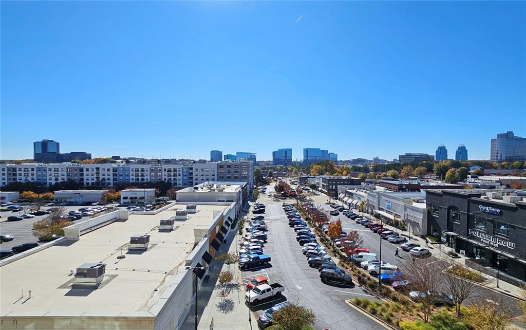 4561 Olde Perimeter Way, Unit 704 Atlanta, GA 30346 - Photo 22 of 45 a view of a city