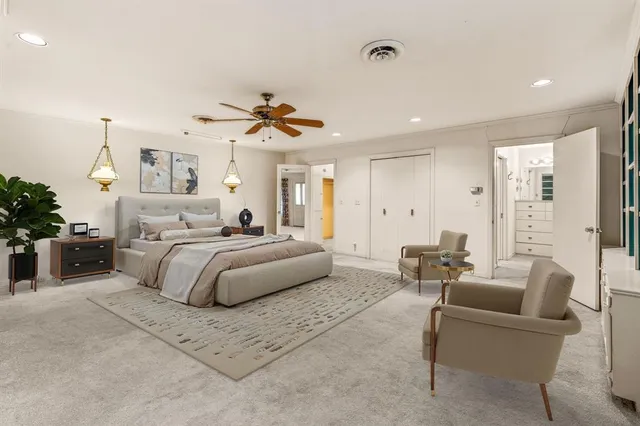 a view of a livingroom with a ceiling fan