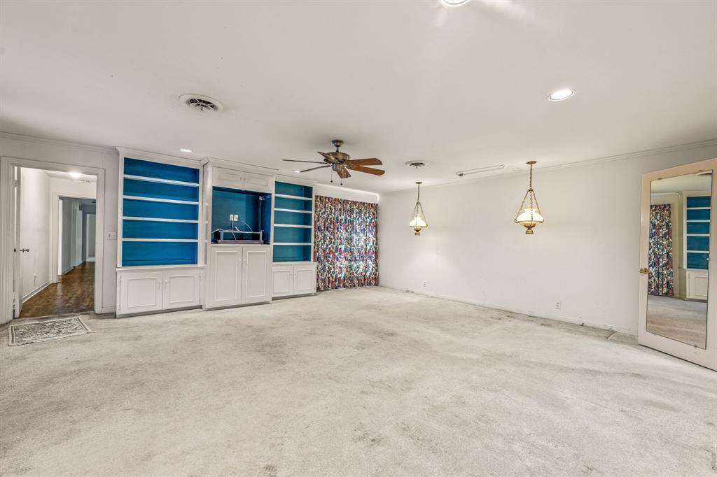 1222 Kentucky Street Graham, TX 76450 - Photo 20 of 37 a view of an empty room with a window