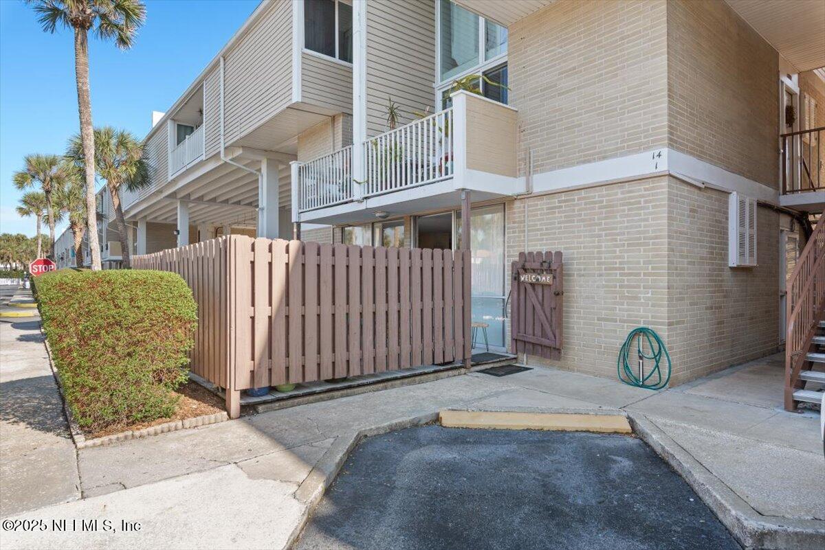 901 Ocean Boulevard, Unit 1 Atlantic Beach, FL 32233 - Photo 32 of 39 a view of a car park in front of a building