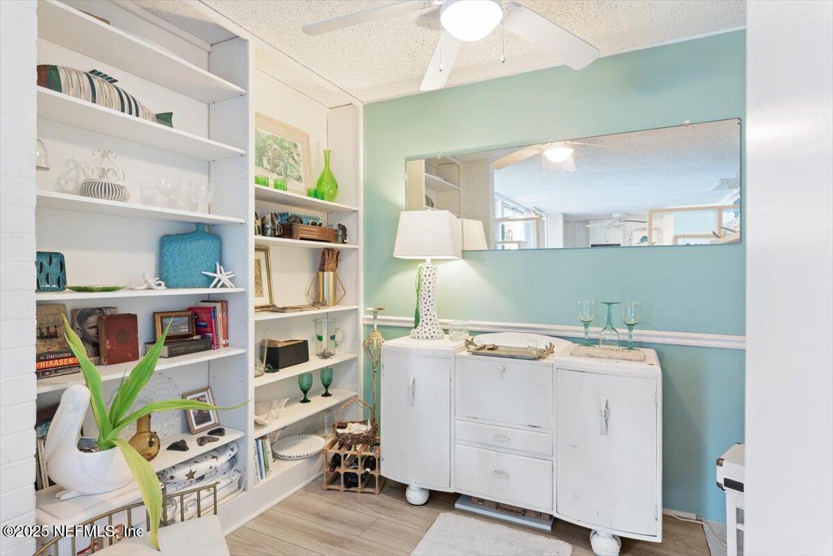 901 Ocean Boulevard, Unit 1 Atlantic Beach, FL 32233 - Photo 9 of 39 a utility room with cabinets dryer and washer