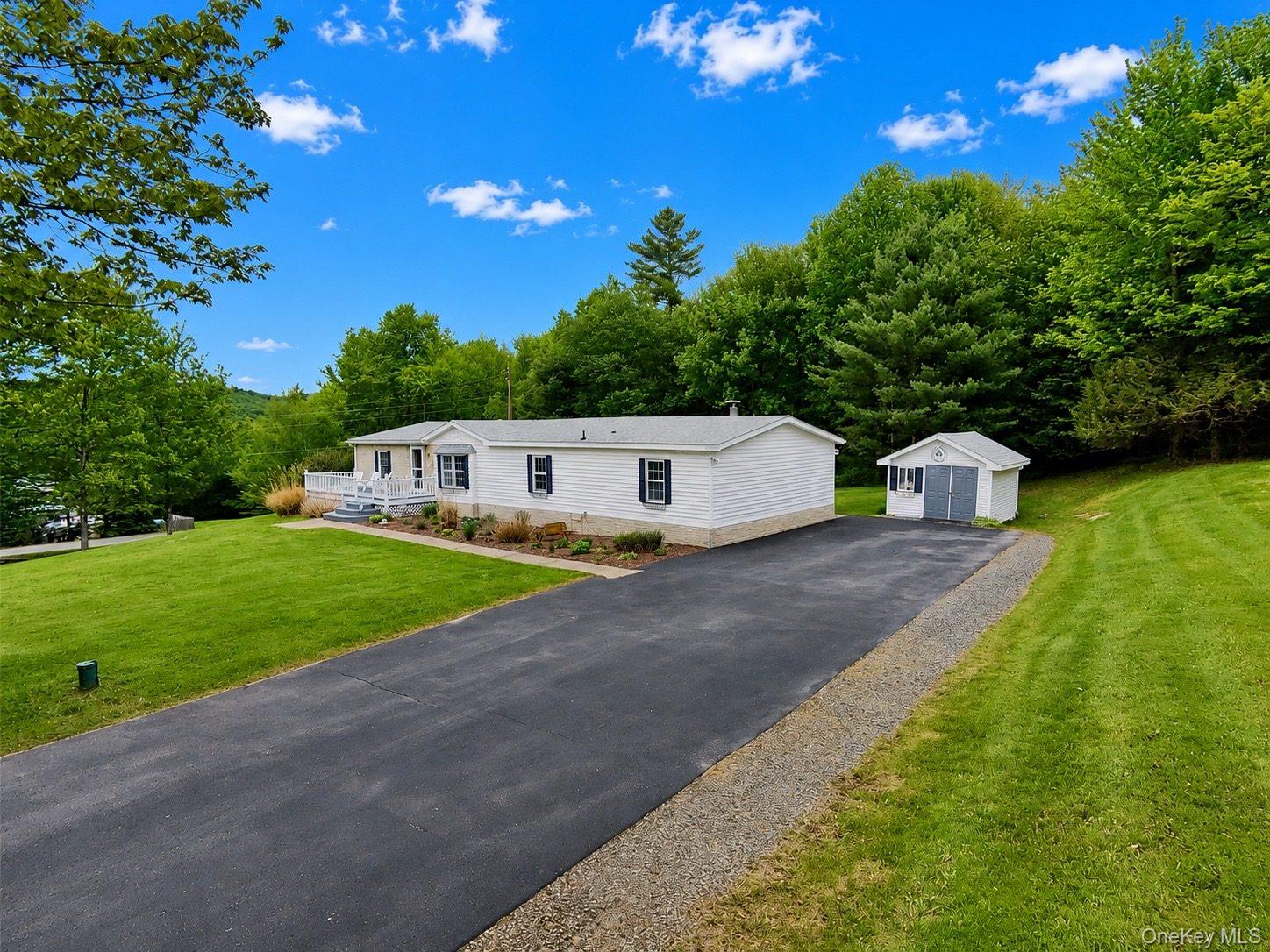 502 Myers Road Neversink, NY 12765 - Photo 6 of 38 a front view of a house with a yard