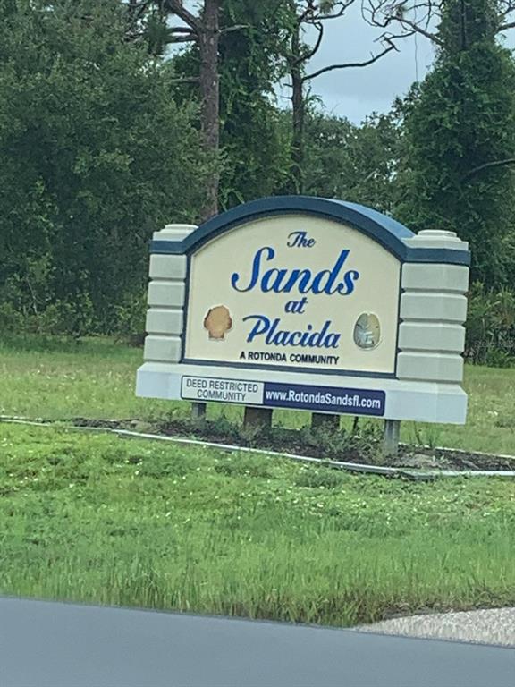 6 Aft Court Placida, FL 33946 - Photo 5 of 5 a sign that is on the side of a building