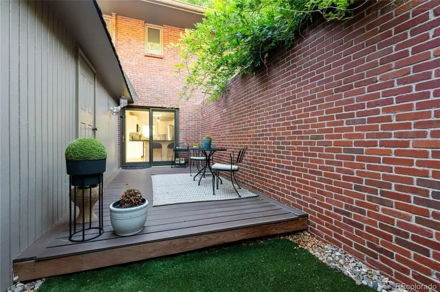 a view of outdoor sitting area with furniture