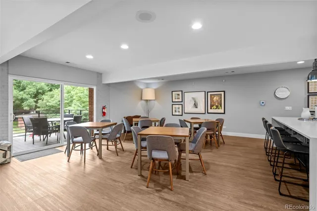 a kitchen with kitchen island cabinets and wooden floor