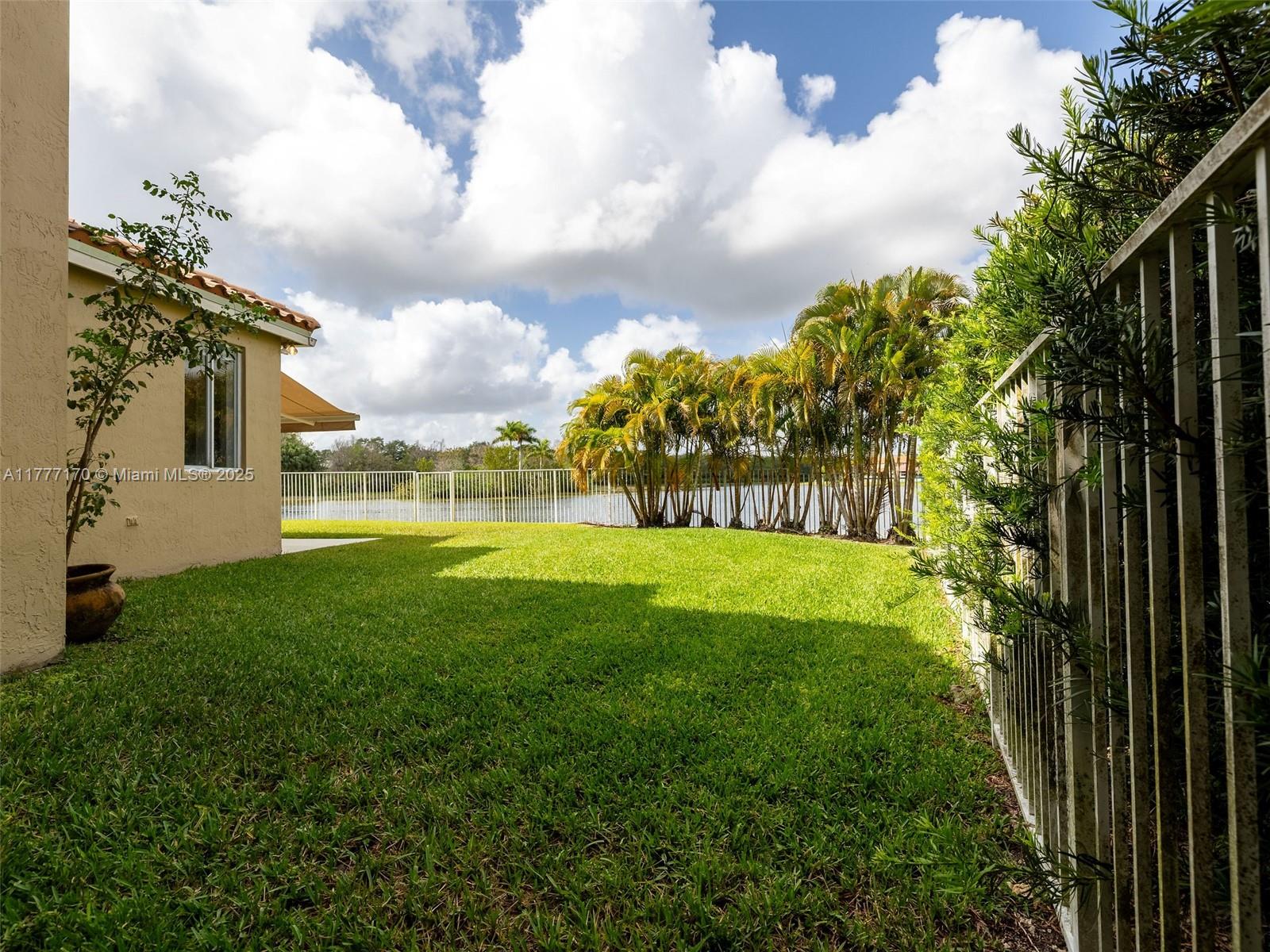 4242 Magnolia Ridge Drive Weston, FL 33331 - Photo 27 of 36 a view of yard with green space