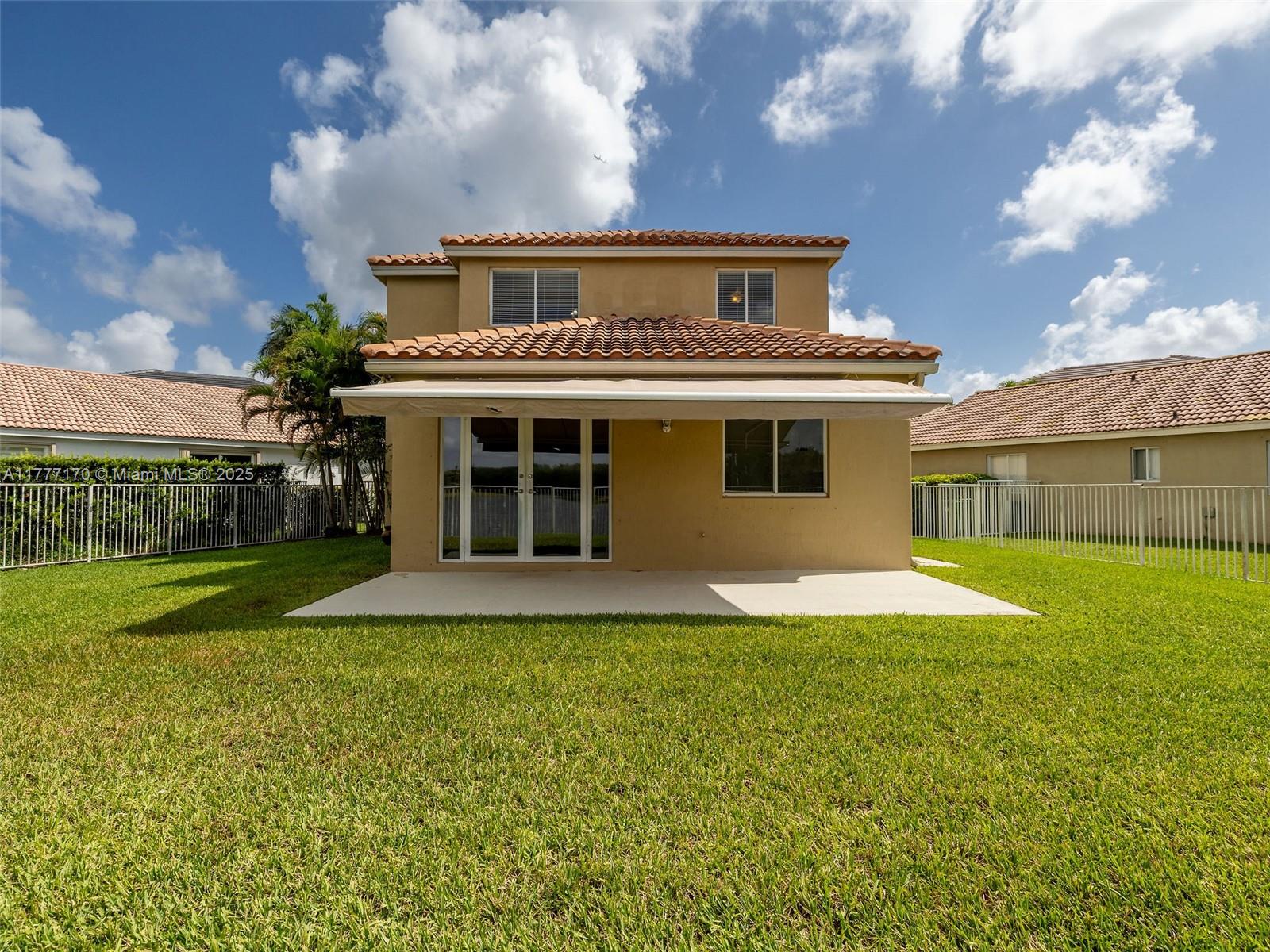 4242 Magnolia Ridge Drive Weston, FL 33331 - Photo 30 of 36 a front view of house with yard and green space