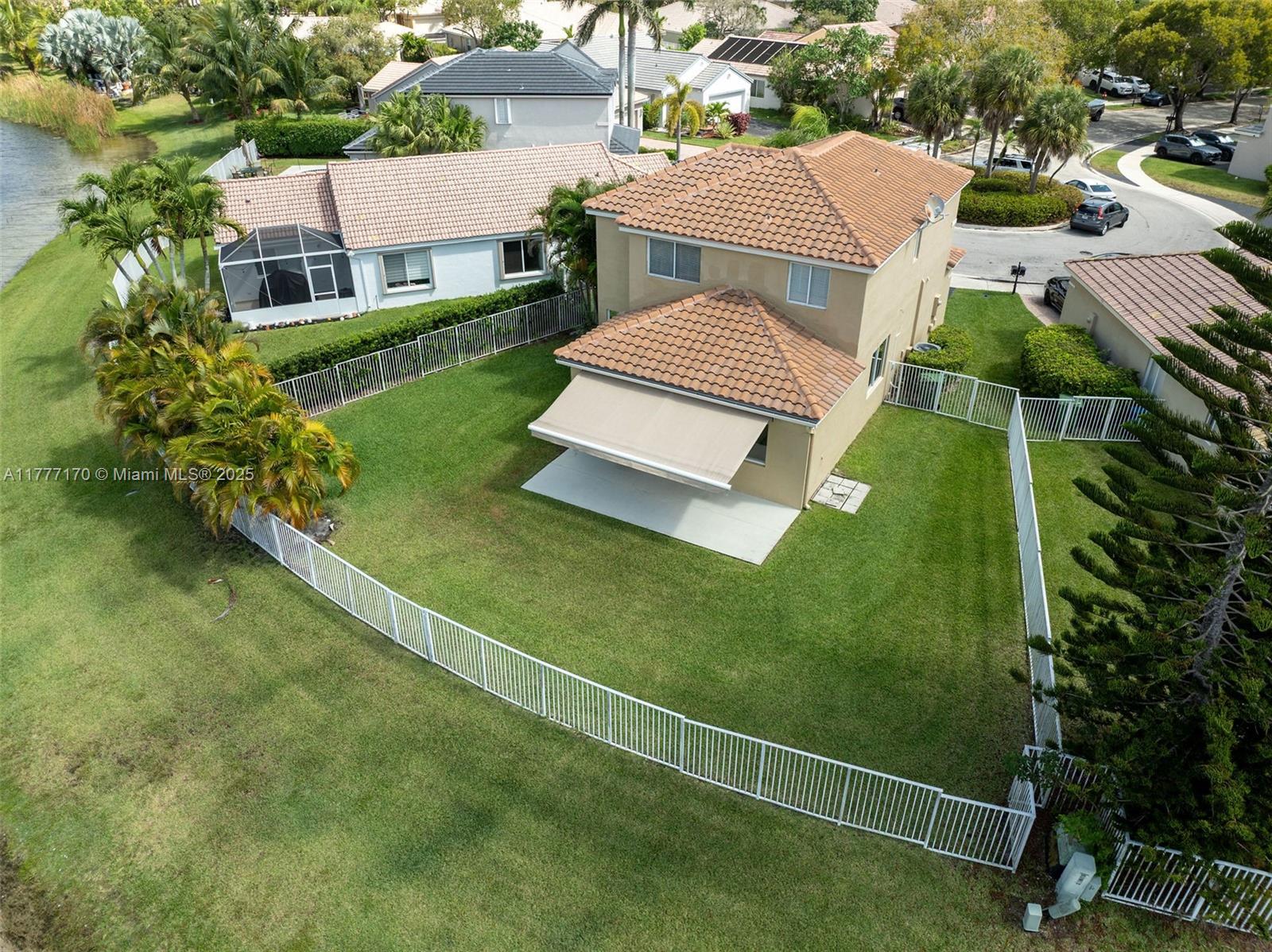 4242 Magnolia Ridge Drive Weston, FL 33331 - Photo 31 of 36 an aerial view of a house