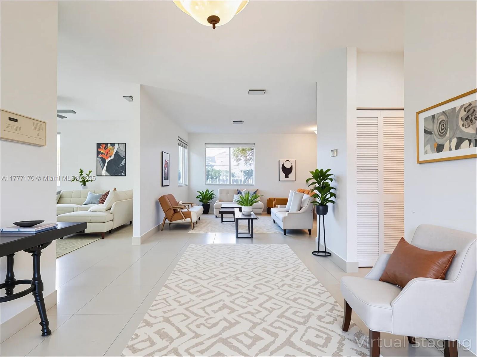 4242 Magnolia Ridge Drive Weston, FL 33331 - Photo 4 of 36 a living room with furniture and a couch