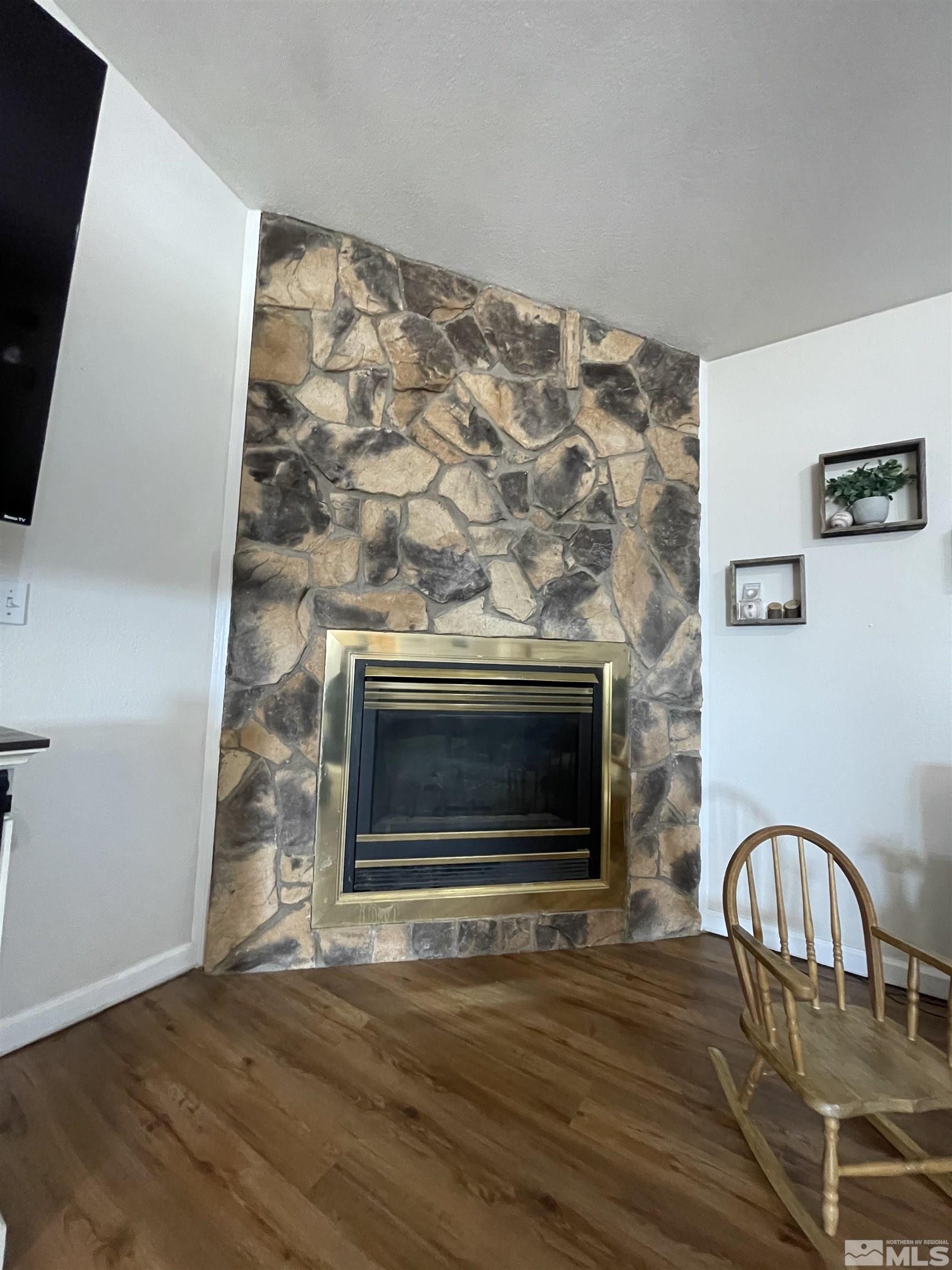 17 Mason Road Yerington, NV 89447 - Photo 23 of 36 a living room with wooden floor