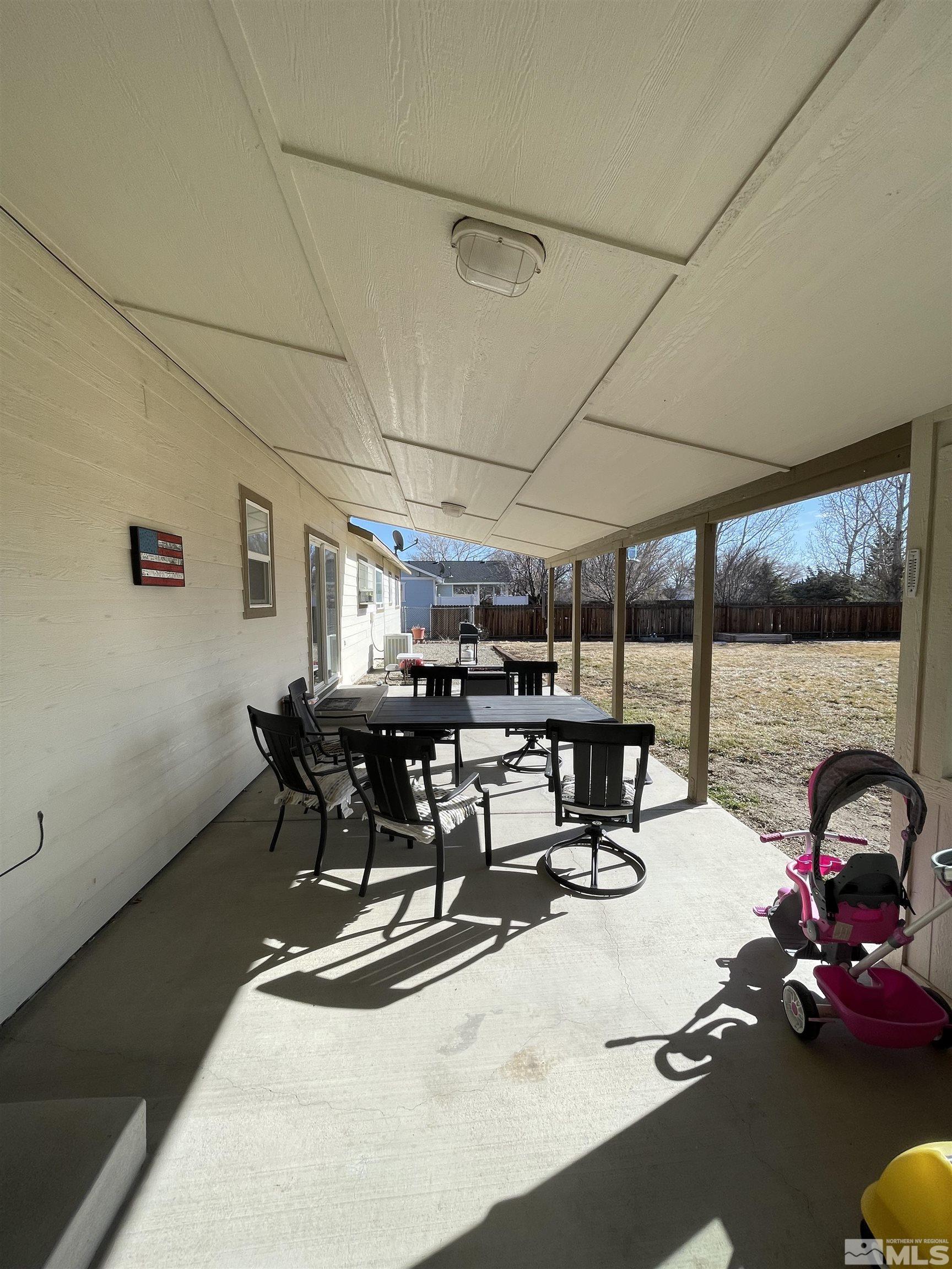 17 Mason Road Yerington, NV 89447 - Photo 25 of 36 a view of a dining area with furniture window and outside view