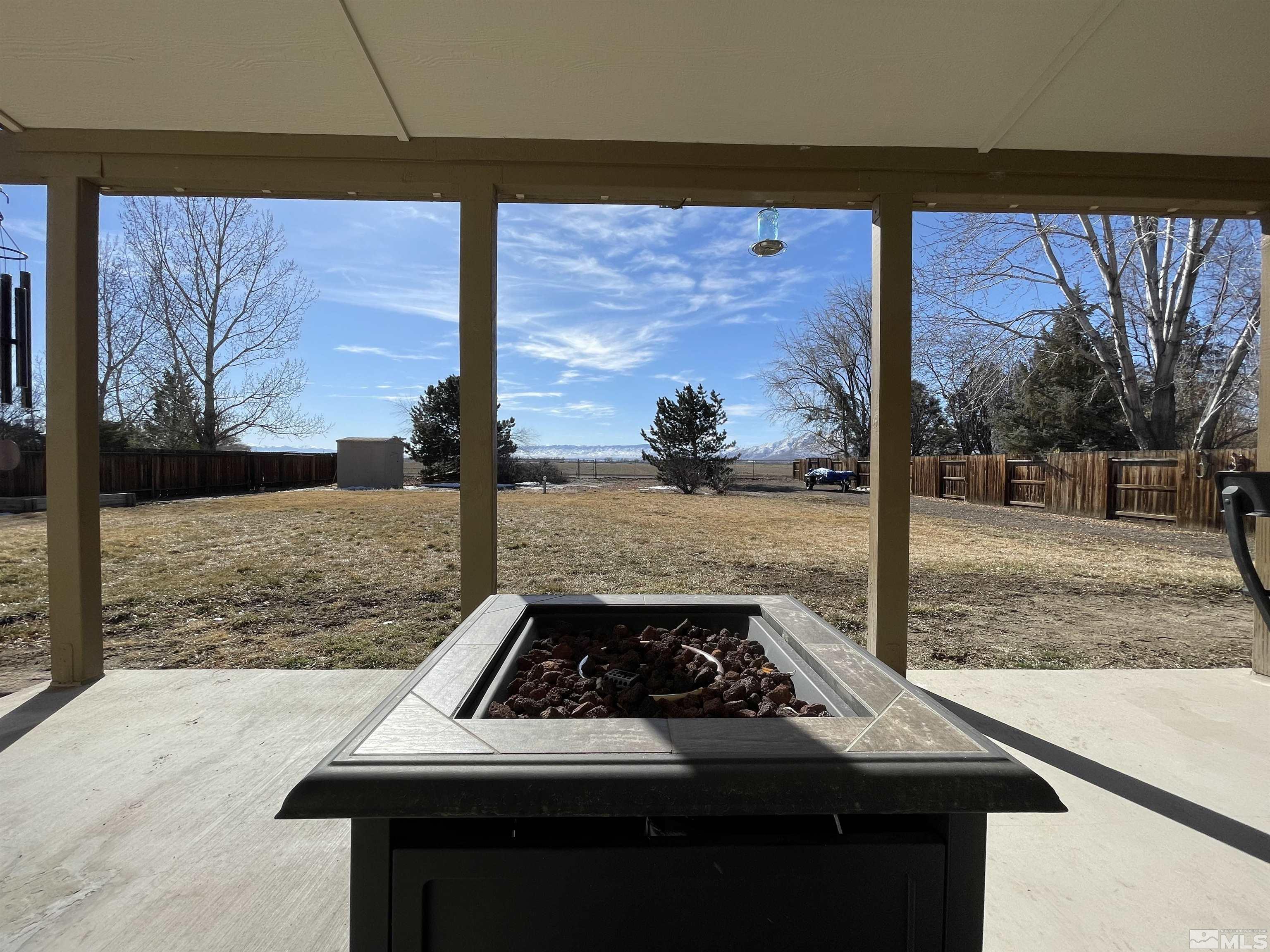 17 Mason Road Yerington, NV 89447 - Photo 26 of 36 a white stove top oven sitting next to a yard