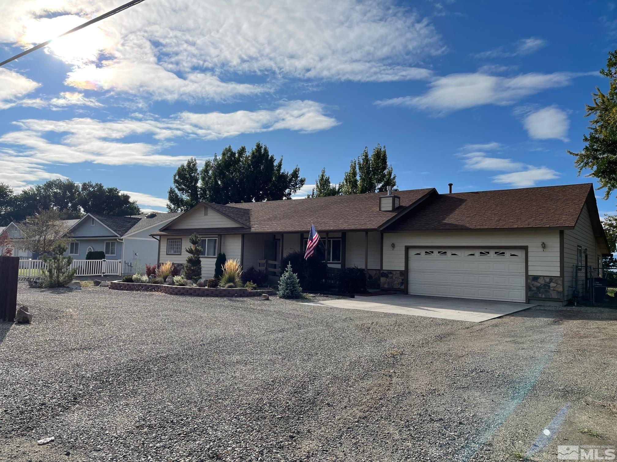17 Mason Road Yerington, NV 89447 - Photo 3 of 36 a view of a house with a yard