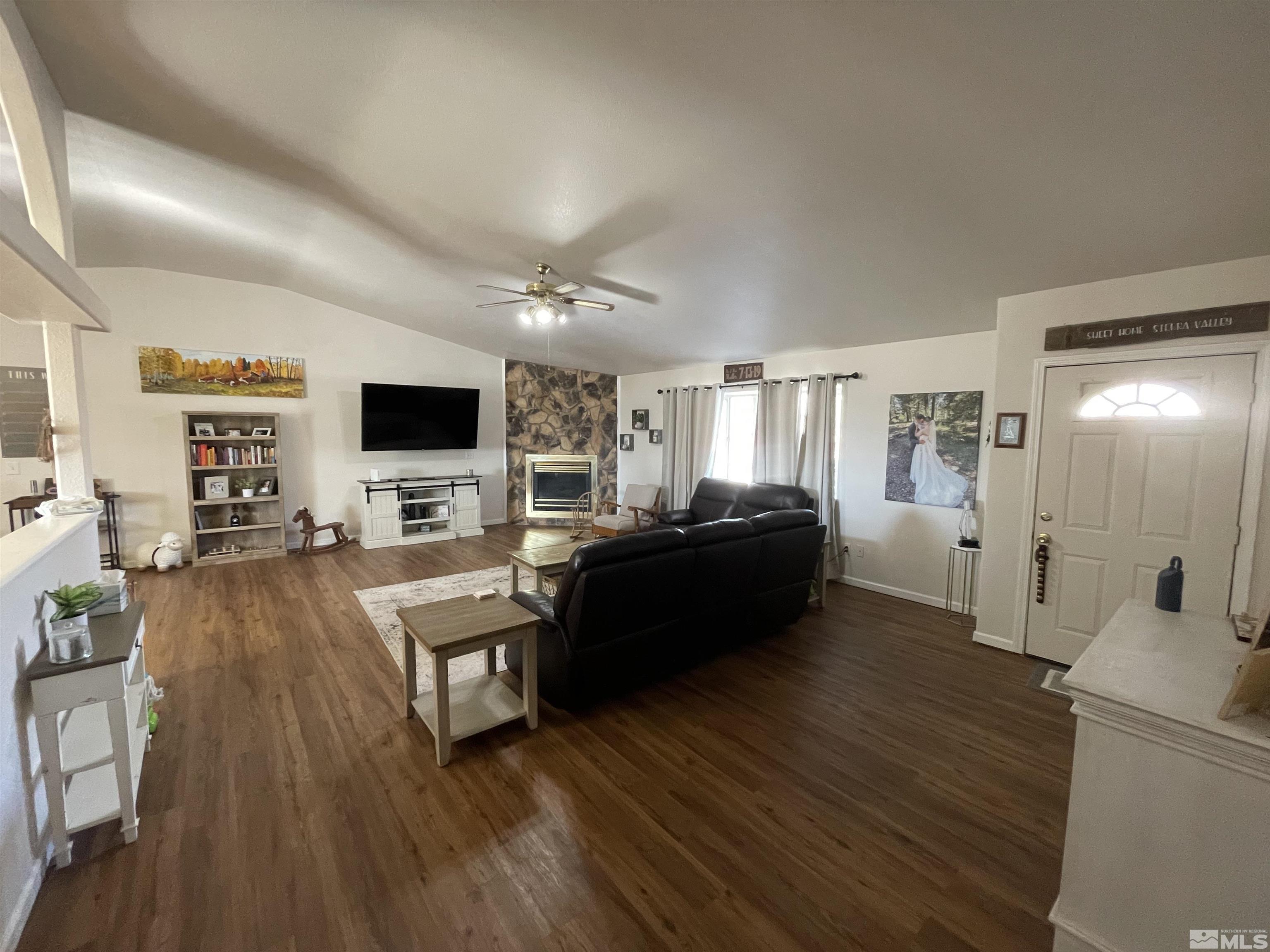 17 Mason Road Yerington, NV 89447 - Photo 6 of 36 a living room with furniture and a flat screen tv