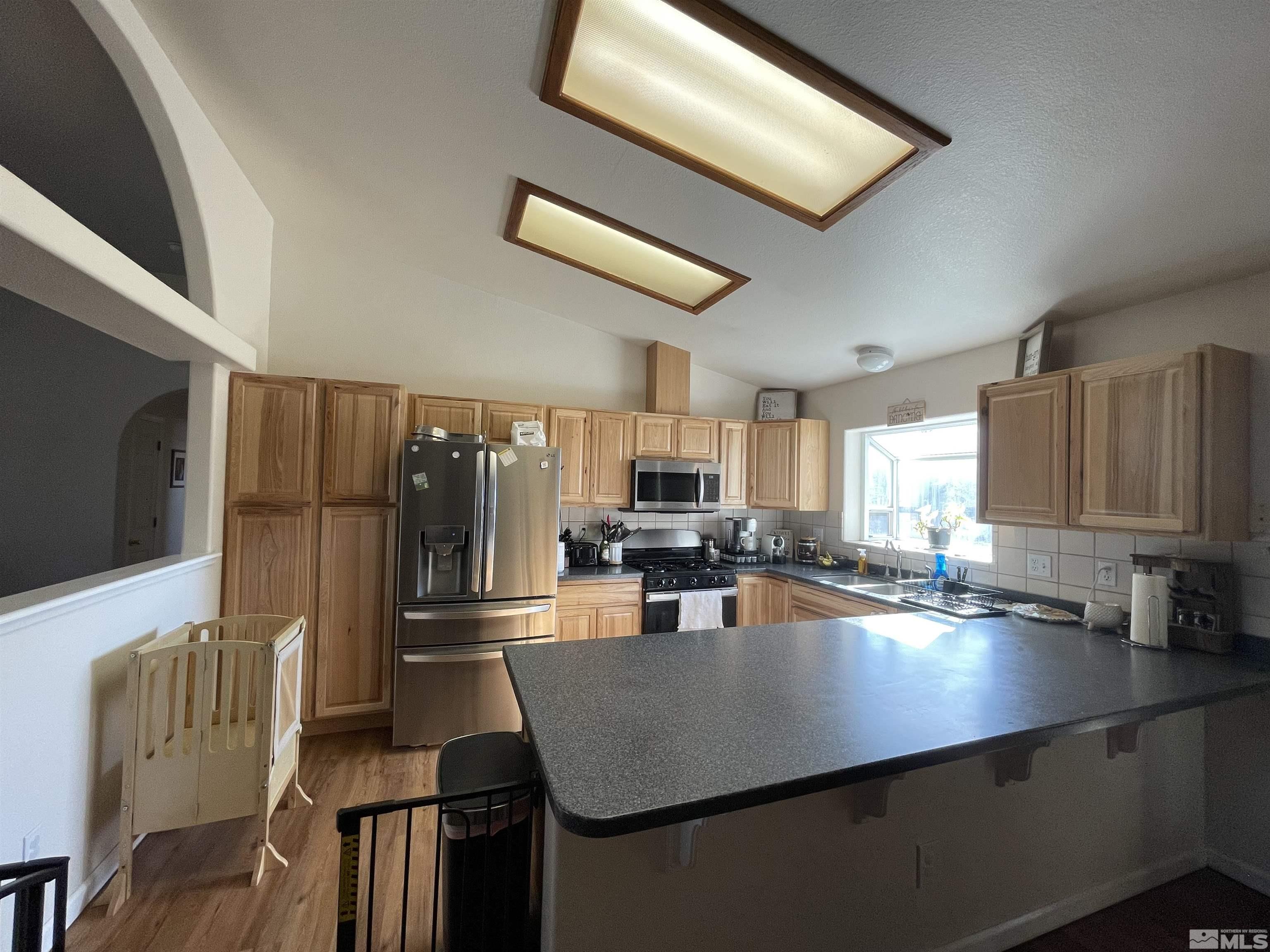 17 Mason Road Yerington, NV 89447 - Photo 7 of 36 a kitchen with counter space cabinets and appliances