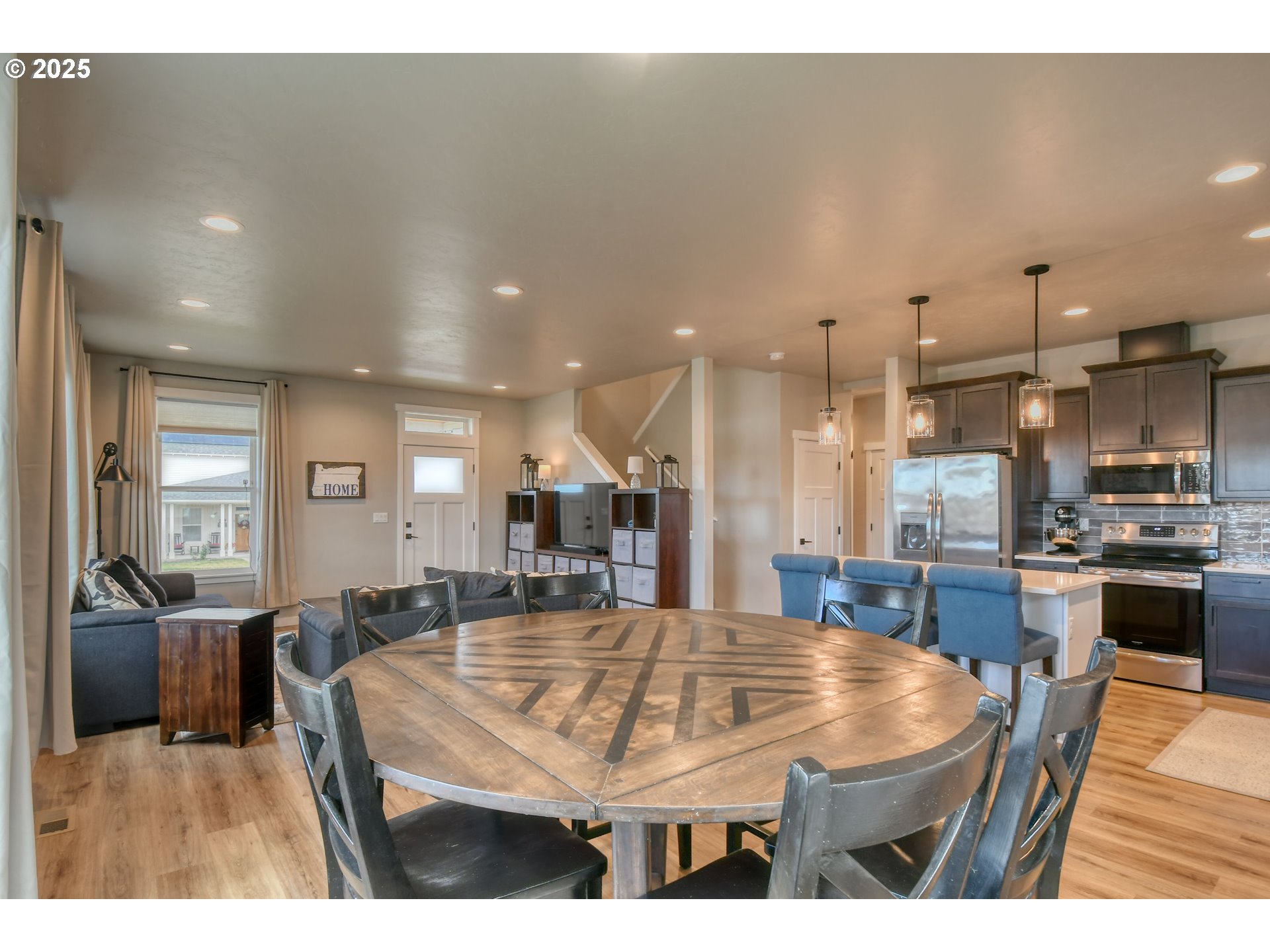 2 Lewis Circle Milton Freewater, OR 97862 - Photo 10 of 47 a large kitchen with kitchen island a sink table and chairs