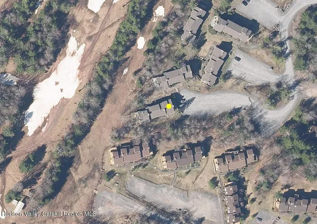 an aerial view of outdoor space with seating space