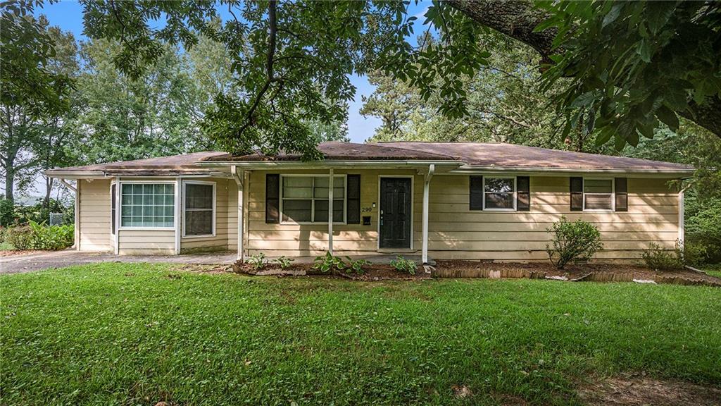 290 Pierce Road Hiram, GA 30141 - Photo 1 of 1 a front view of house with yard and green space