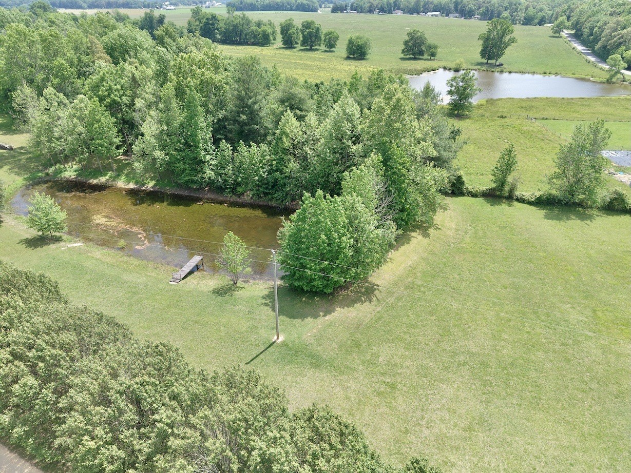 4929 Fountain Grove Road Morrison, TN 37357 - Photo 8 of 33 a view of a lake with a yard