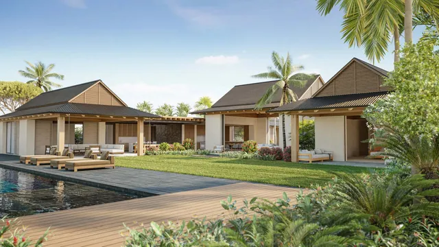 a front view of a house with a yard table and chairs