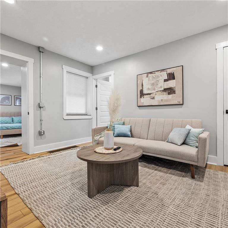 1117-1119 Spring Garden Avenue Pittsburgh, PA 15212 - Photo 5 of 27 a living room with furniture and window