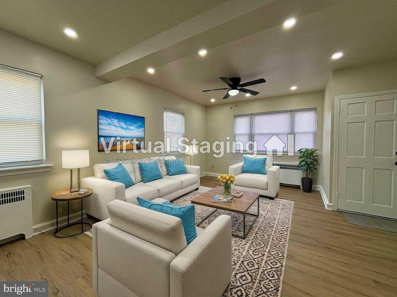 6644 Hollis Street, Unit 1 Philadelphia, PA 19138 - Photo 7 of 14 a living room with furniture
