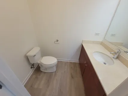a bathroom with a sink and a toilet