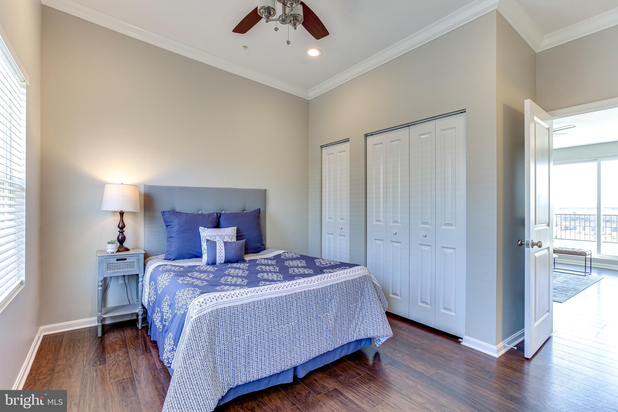 4603 Dillon Street Baltimore, MD 21224 - Photo 29 of 35 Bedroom 3 w/ Hardwood Floors & Ceiling Fan