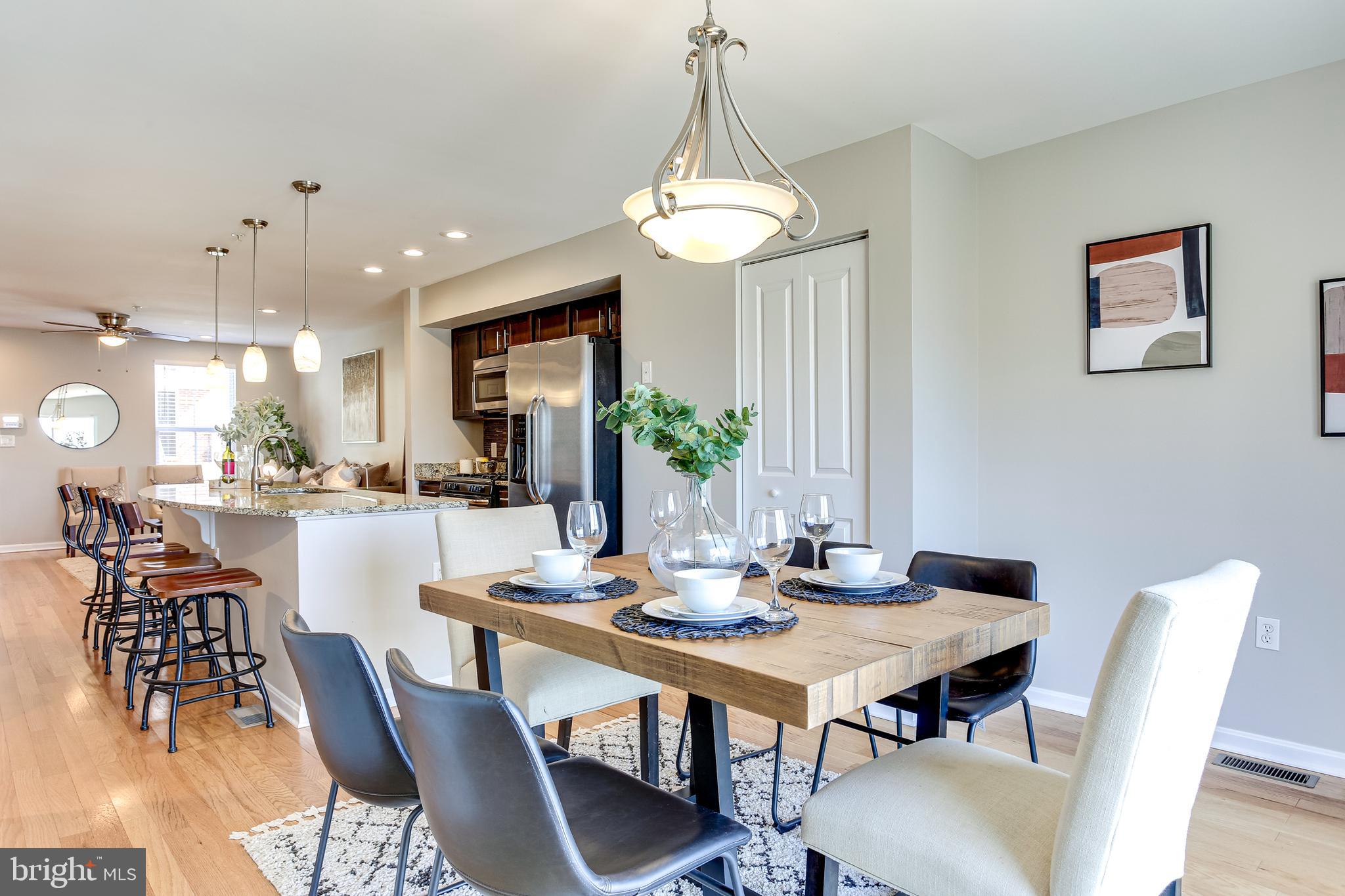 4603 Dillon Street Baltimore, MD 21224 - Photo 10 of 35 Gourmet Kitchen Opens to Dining Area
