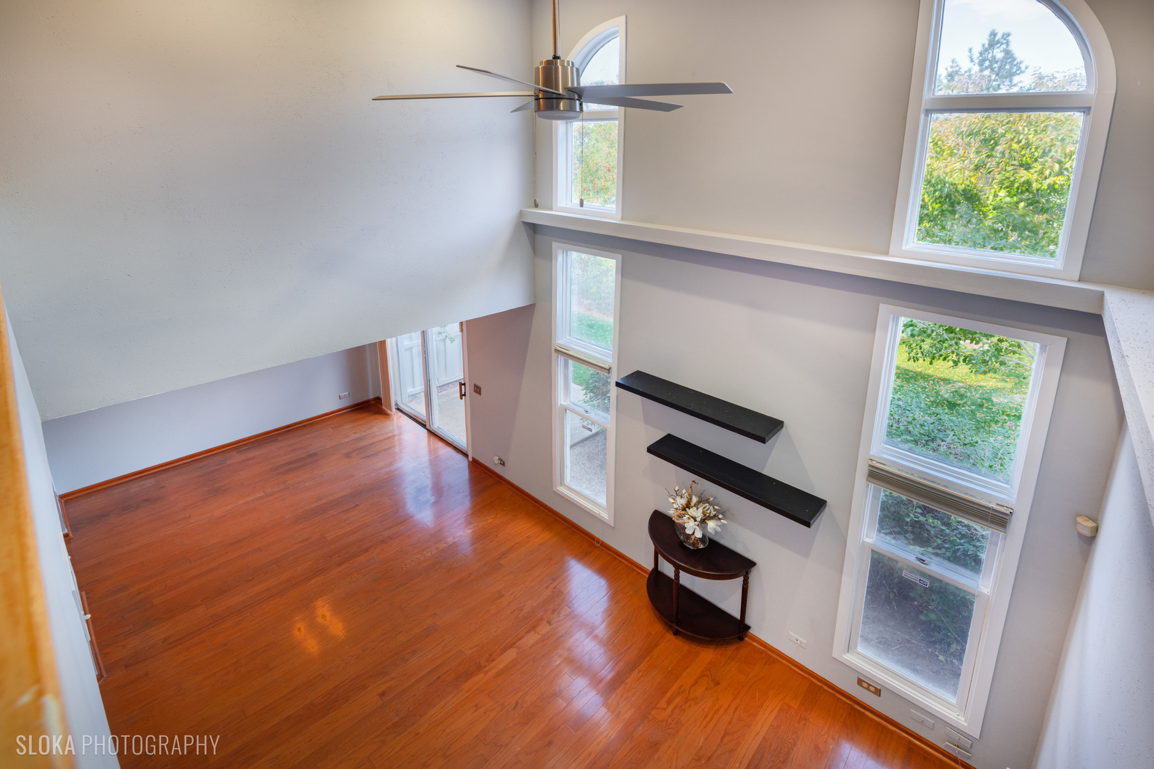 2342 Hamilton Place Schaumburg, IL 60107 - Photo 9 of 25 wooden floor in an empty room with a window