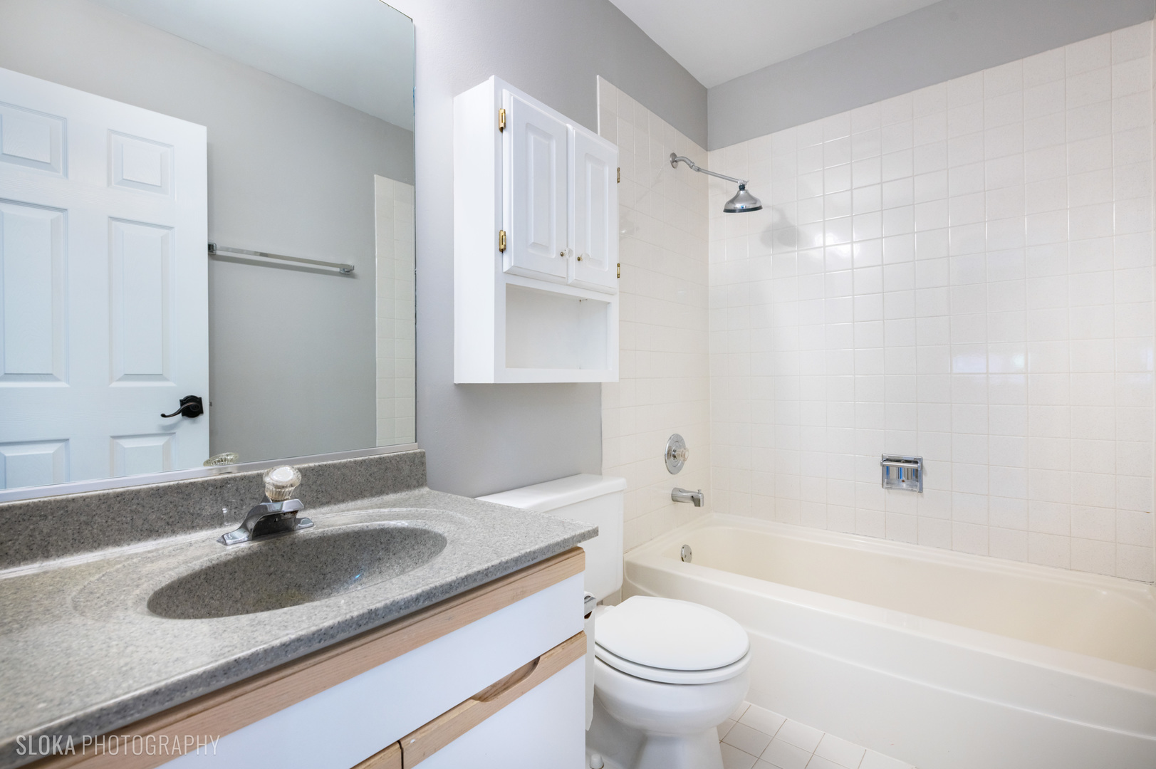 2342 Hamilton Place Schaumburg, IL 60107 - Photo 10 of 25 a bathroom with a sink double vanity granite toilet tub and shower