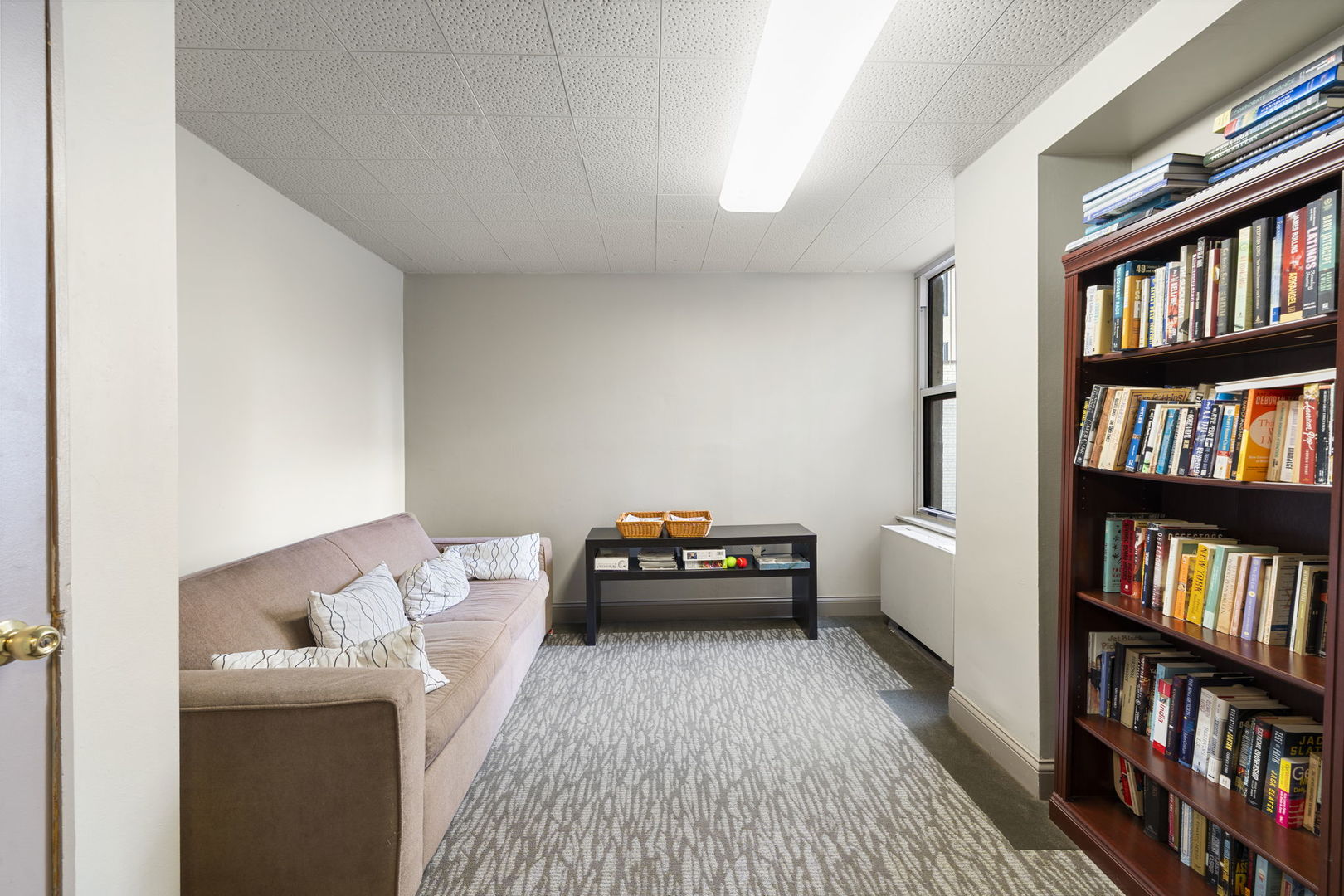 525 West Hawthorne Place, Unit 2606 Chicago, IL 60657 - Photo 22 of 37 a bedroom with furniture and a book shelf