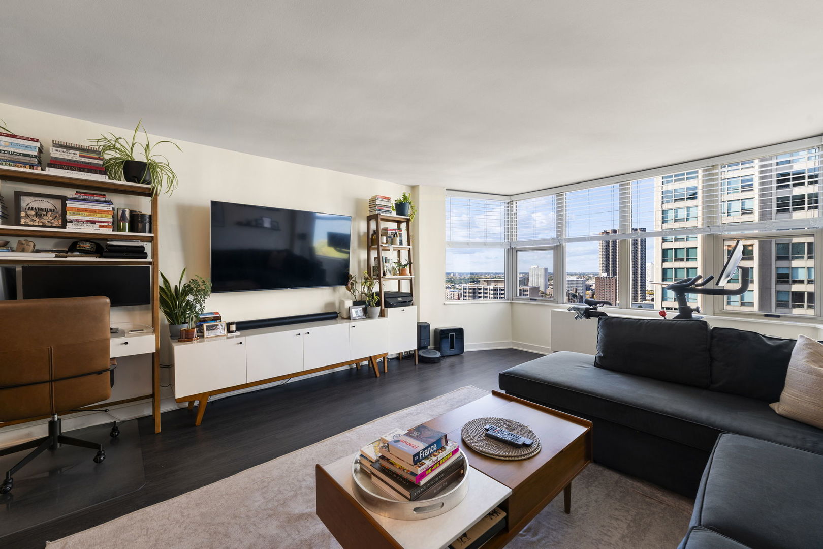 525 West Hawthorne Place, Unit 2606 Chicago, IL 60657 - Photo 3 of 37 a living room with furniture and a flat screen tv