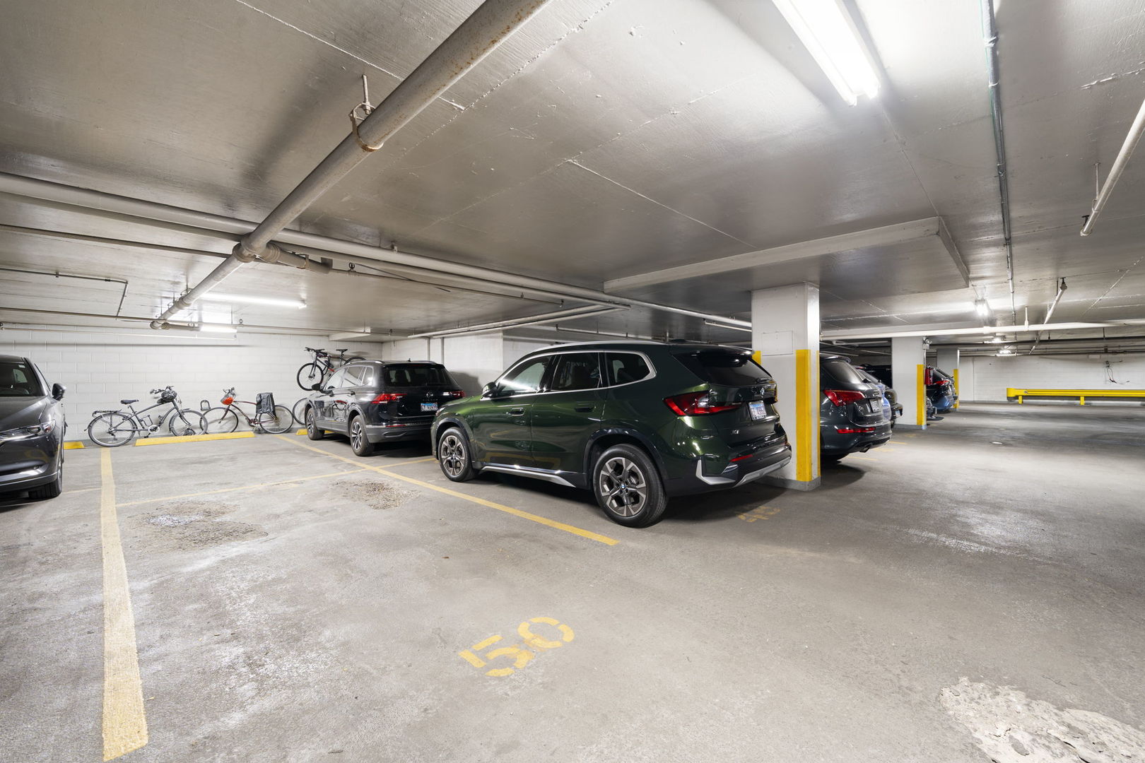 525 West Hawthorne Place, Unit 2606 Chicago, IL 60657 - Photo 31 of 37 a view of parking garage with cars