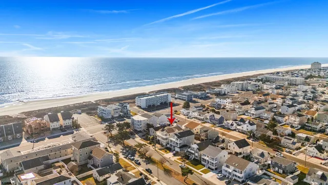 an aerial view of beach and ocean