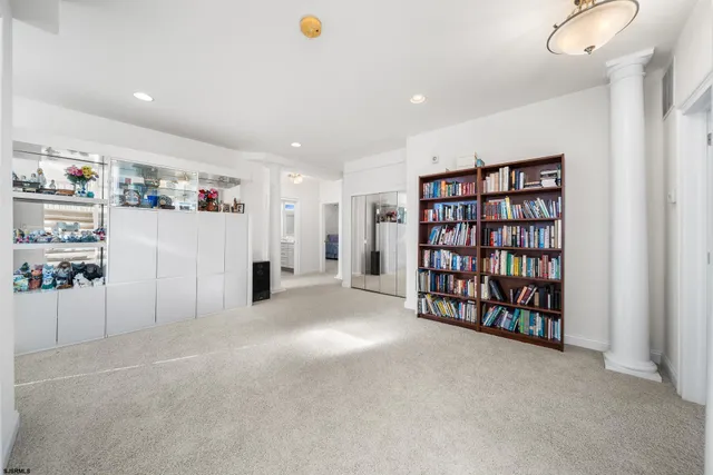 a view of an empty room with shelves