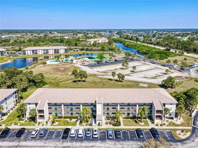 an aerial view of a swimming pool and outdoor space