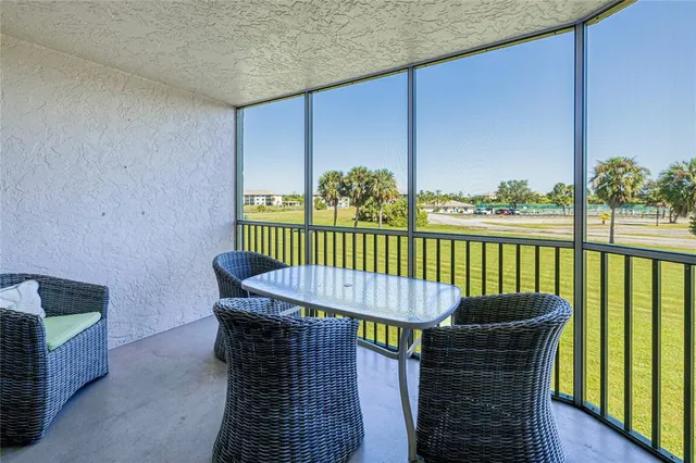 a balcony with a swing