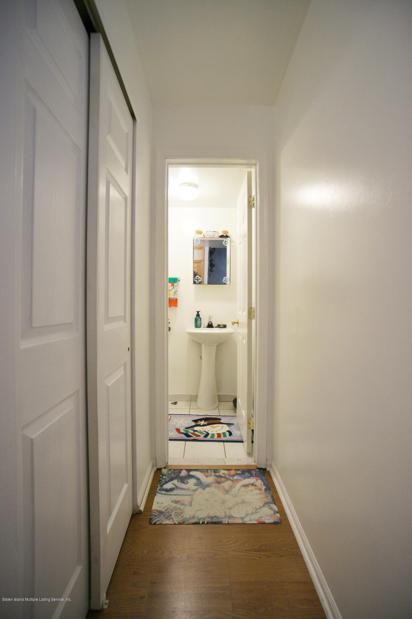 1316 Arthur Kill Road Staten Island, NY 10312 - Photo 13 of 19 2nd fl. half bath & large closet