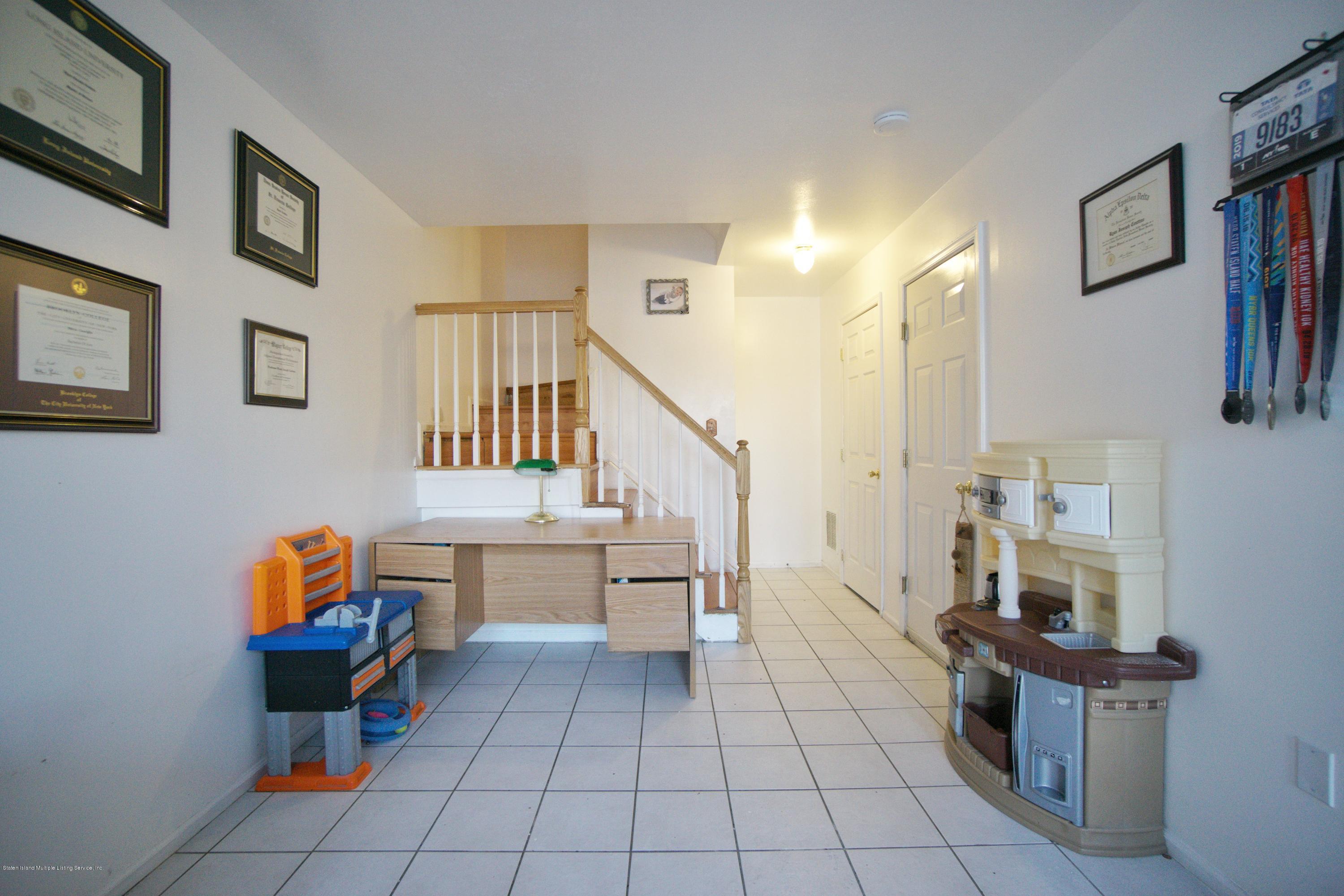 1316 Arthur Kill Road Staten Island, NY 10312 - Photo 3 of 19 level 1, garage, laundry & family room