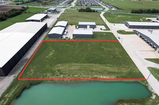 a view of swimming pool with a garden and deck